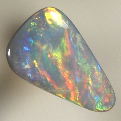 SOLID SEMI BLACK OPAL Bright red to yellow rolling flashes